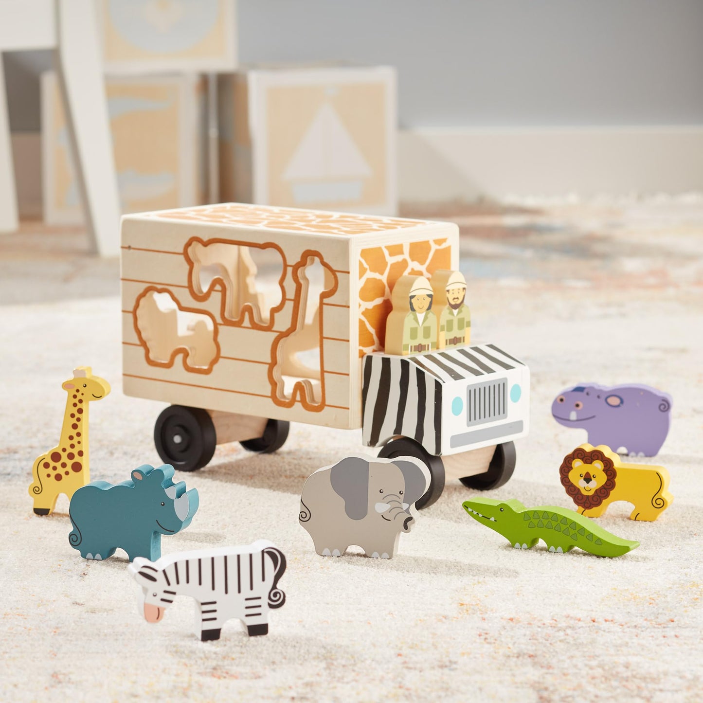Melissa & Doug Animal Rescue Shape-Sorting Truck - Wooden Toy with 7 Animals and 2 Play Figures