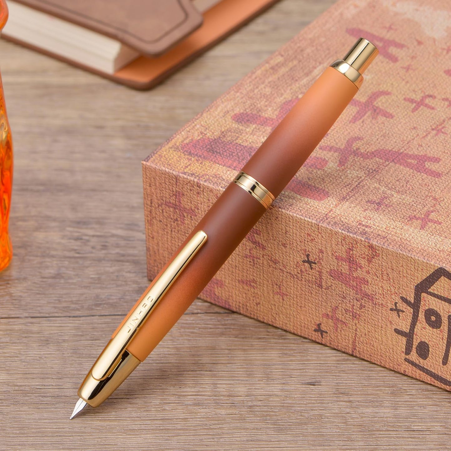 Jinhao 10 Press Fountain Pen with Box, Caramel Orange Gradient Retractable Extra Fine Nib with Ink Converter Set (Golden Clip)