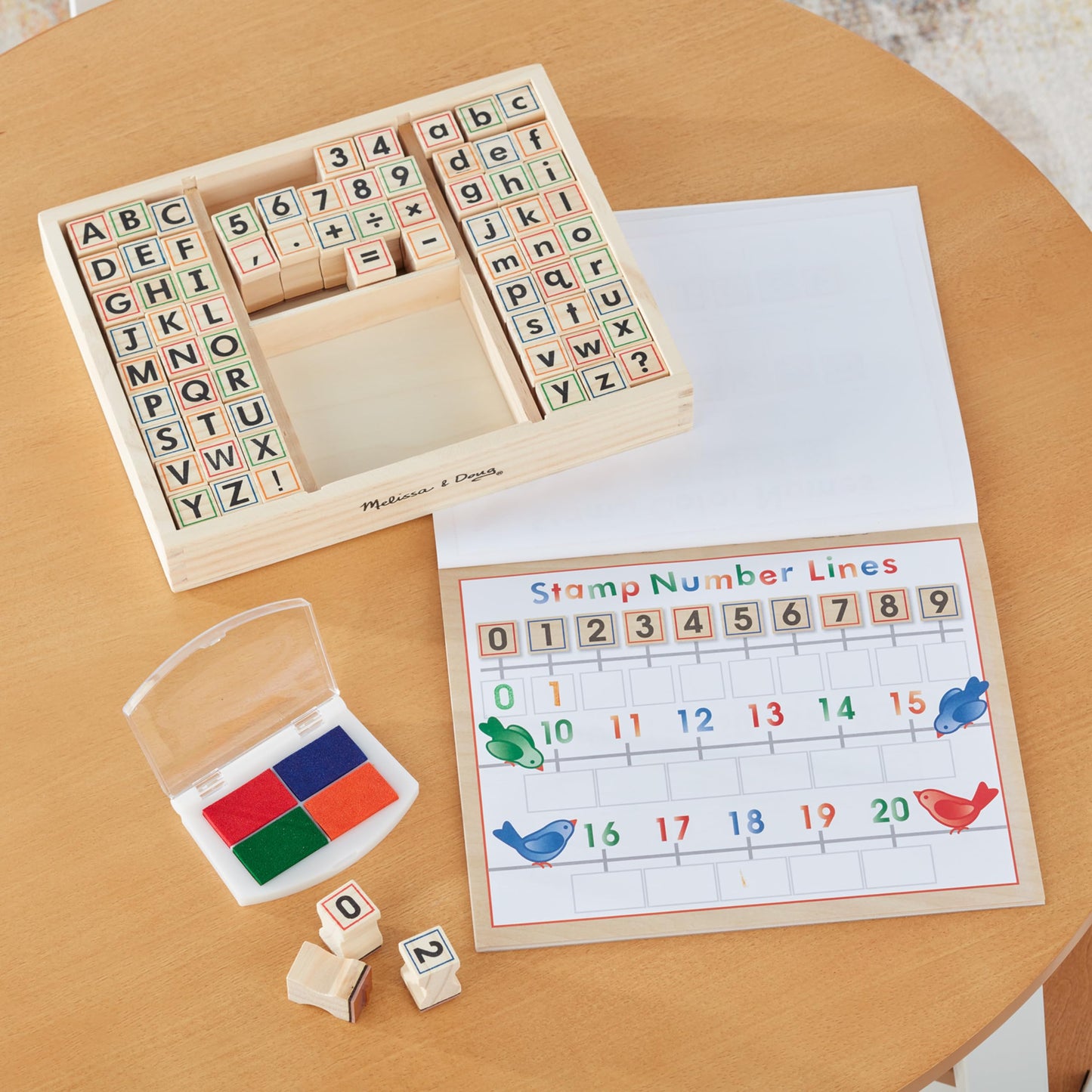 Melissa & Doug Deluxe Letters and Numbers Wooden Stamp Set ABCs 123s With Activity Book, 4-Color Stamp Pad - FSC Certified