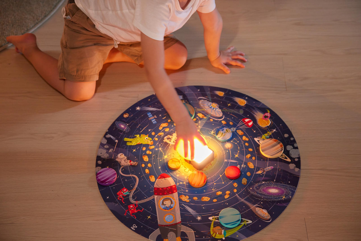 Hape Solar System Puzzle | Round Solar System Puzzle Toy for Kids, Solid Wood Pieces and A Glowing LED Sun