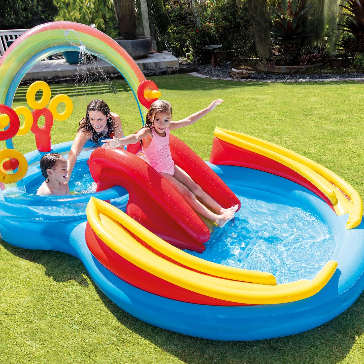 Intex 57453EP 9.75 Foot x 6.3 Foot x 53 Inch Multicolor Rainbow Slide Kids Inflatable Pool with Water Slide and Ring Toss for Children Ages 2 and Up